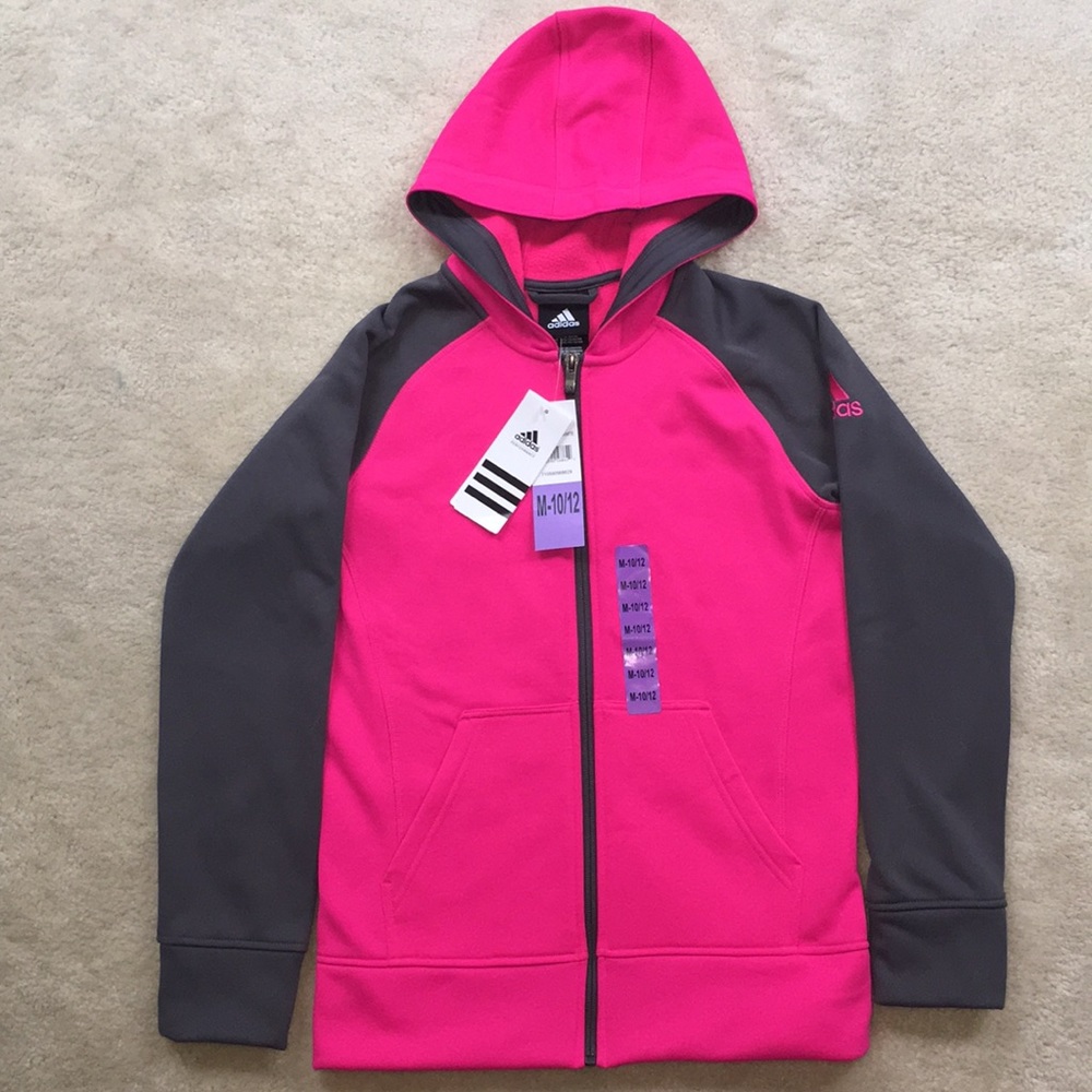 Kids never worn pink Adidas jacket.